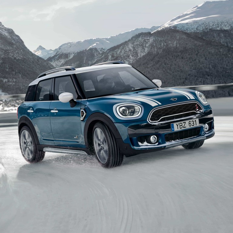 MINI Countryman drives up a mountain road with All4 All-Wheel Drive